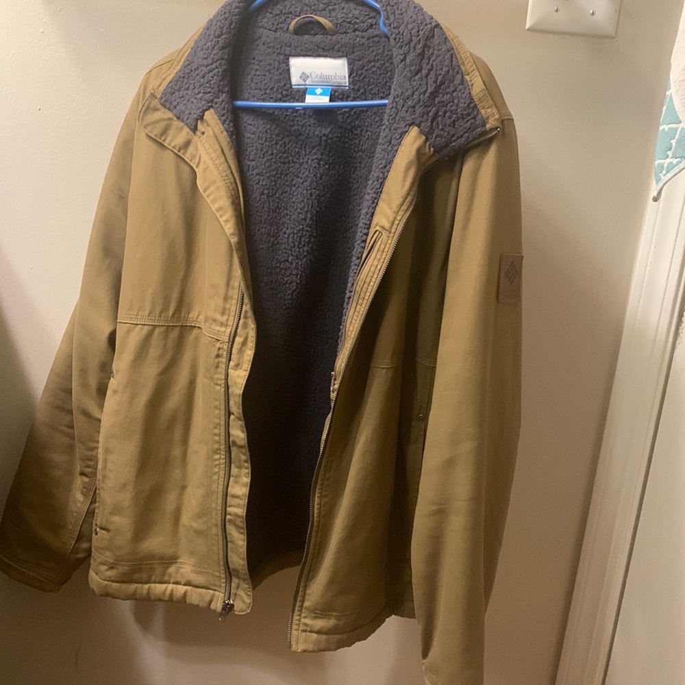 tan columbia jacket with fur on inside.